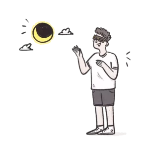 Guy observing a solar eclipse wearing solar eclipse safety glasses